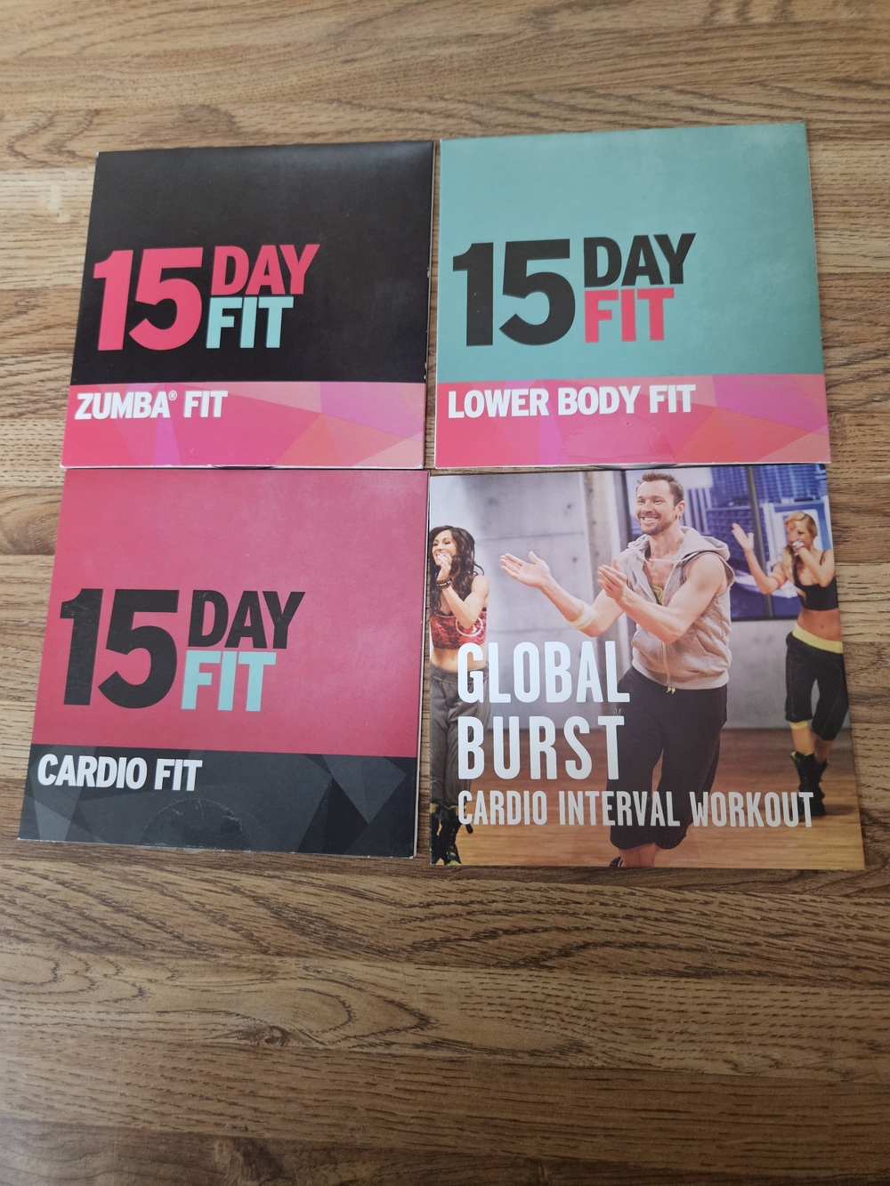 Zumba Fitness 15 Day Fit DVD Set with Pink, Teal, Black Covers